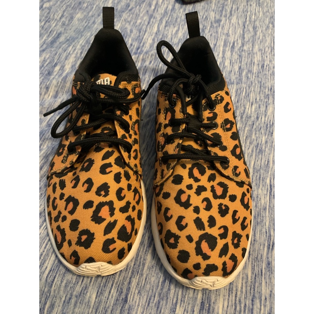 Leopard print Pumas